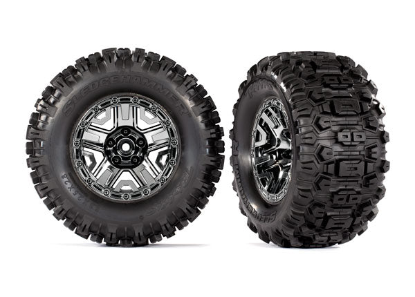 Traxxas TRX9072 - Tires & wheels, assembled, glued (black chrome 2.8' wheels, Sledgehammer, tires, foam inserts) (2)