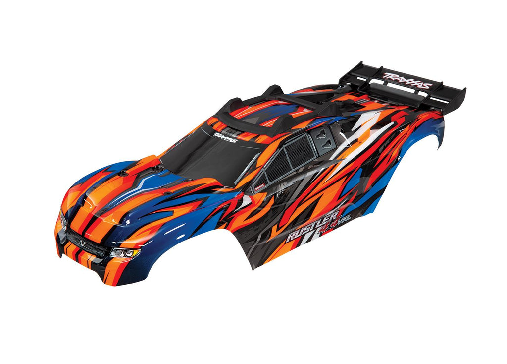 Traxxas TRX6717T - Body, Rustler 4X4 VXL, orange/ window, grille, lights decal sheet (